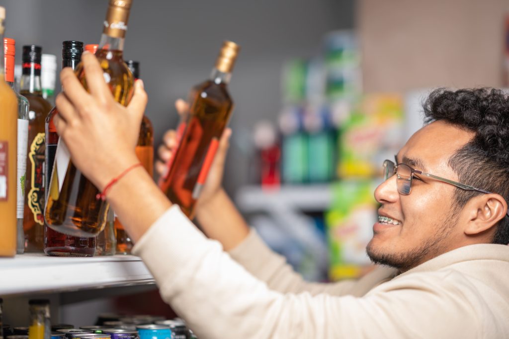 http://man-buying-bottles-of-alcohol-in-a-supermarket-2025-03-09-14-06-37-utc%20(2)